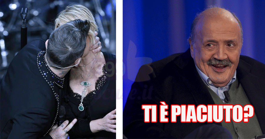 Bacio sexy tra Robbie Williams e Maria De Filippi